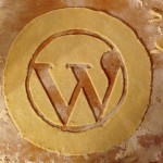 The WordPress logo cut into pie crust dough.